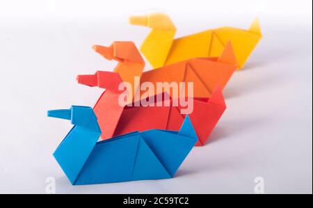 Colorful Origami Swan. Isolated on White background. Stock Photo