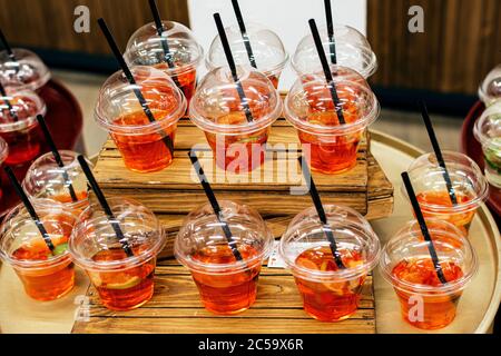 Orange juice with lime on wooden boards Stock Photo