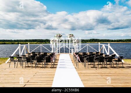 Summer decor of the wedding ceremony in nature Stock Photo
