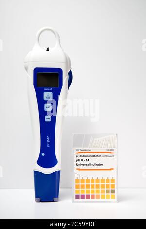 pH test strips acid-base balance and base tablets Stock Photo - Alamy