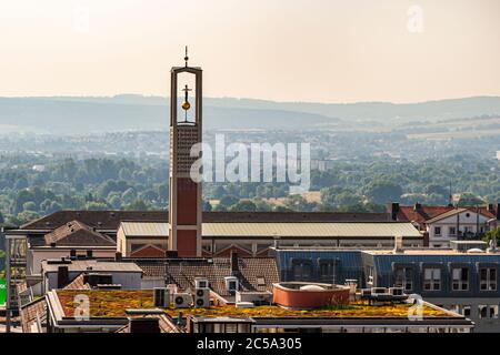 Sculpture by the artist Stephan Balkenhol on the tower of the catholic church Sankt Elisabeth in Kassel, Germany Stock Photo