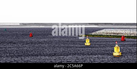 port of rotterdam, zuid holland/netherlands - july 09, 2013: yellow and red beacons on the waters of the newly reclaimed maasvlakte 2 - Stock Photo