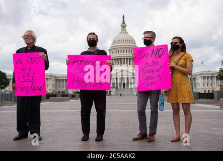 Washington, United States. 01st July, 2020. Activist holds a protest against China's adoption of a new national security law applying to Hong Kong, at the U.S. Capitol in Washington, DC on Wednesday, July 1, 2020. The group alleges the new law attempt to restrict free speech and human rights in Hong Kong. Photo by Kevin Dietsch/UPI Credit: UPI/Alamy Live News Stock Photo