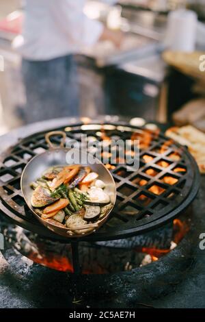 Close-up of the pan with grilled vegetables. Stock Photo