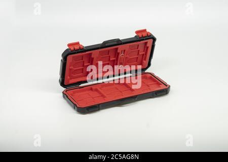 Closeup shot of an opened empty toolbox on the white background Stock Photo