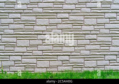 Gray brick wall. Dark abstract background. Building brick construction. Stock Photo