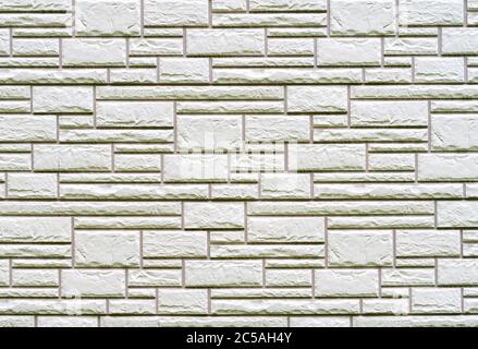Gray brick wall. Dark abstract background. Building brick construction. Stock Photo