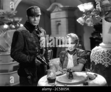 CHARLES BOYER and MARLENE DIETRICH in I LOVED A SOLDIER 1936 director HENRY HATHAWAY play Lajos Biro novel Melchior Lengyel Paramount Pictures UNCOMPLETED and UNRELEASED FILM Stock Photo