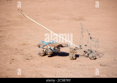 African children's toy car truck, made of wire and recycled plastic bottles Stock Photo