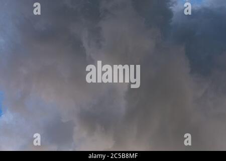 incoming storm close-up cloudscape at july daylight in continental europe Stock Photo