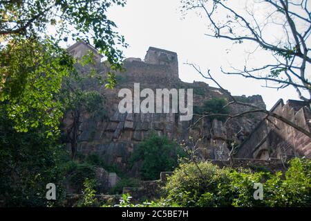 Ranthambore Fort lies within the Ranthambore National Park, near the town of Sawai Madhopur, the park being the former hunting grounds of the Maharaja Stock Photo