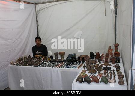 Rosarito Baja California Norte Mexico July/30/2016 indigenous boy selling Mexican and Latin American crafts Stock Photo