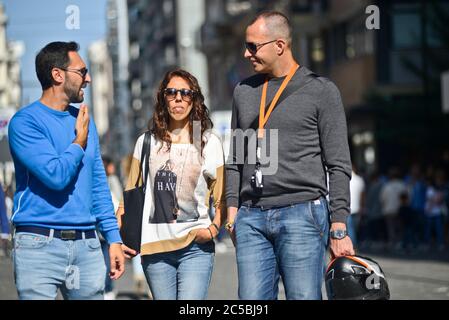 Italian friends walking and talking in Via Sparano da Bari. Bari, Italy Stock Photo