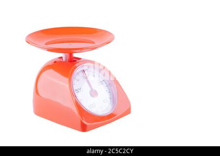 analog kitchen weight scale on white background kitchen equipment object isolated Stock Photo