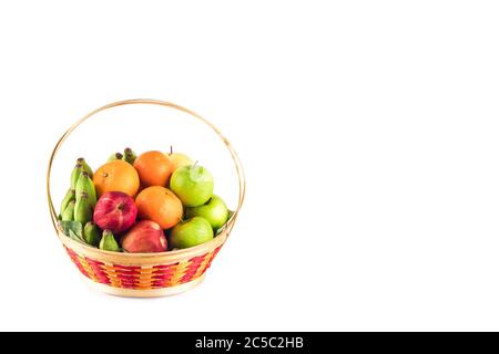 orange, Chinese pear, banana, red apple and green apple in wicker basket on white background fruit health food isolated Stock Photo