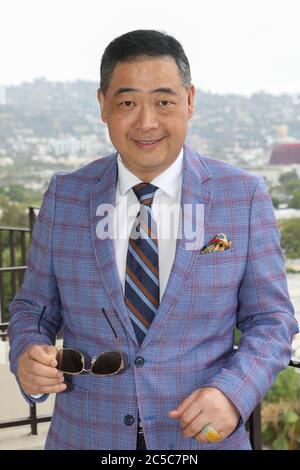 Beverly Hills, California, USA. 1st July, 2020. TV host Joey Zhou poses for the camera at the Four Seasons Hotel Los Angeles in Beverly Hills, California. Joey Zhou is the founder of The Beverly Arts and The Beverly News. Credit: Sheri Determan Stock Photo