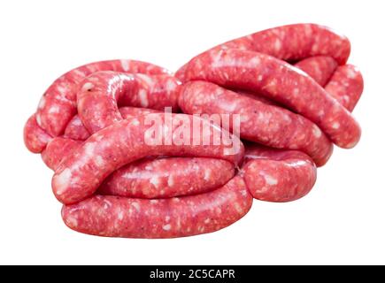 Raw sausages prepared for frying. Traditional meat products. Isolated over white background Stock Photo