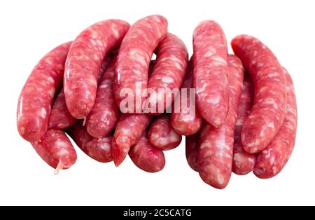 Raw frankfurters for frying from minced pork and veal. Isolated over white background Stock Photo