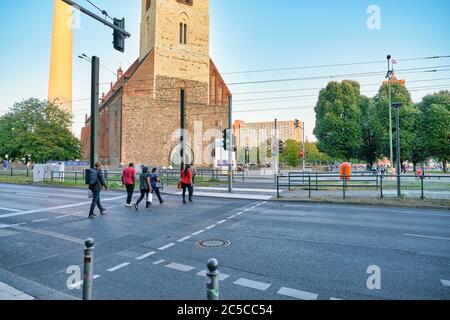 BERLIN, GERMANY - CIRCA SEPTEMBER, 2019: people crossing the road in Berlin in the daytime. Stock Photo