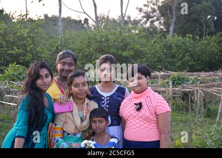 Panchita, Bongaon, West Bengal, India, 7th Dec., 2019: A group beautiful Indian teenage girls in a group in the fields, selective focusing Stock Photo