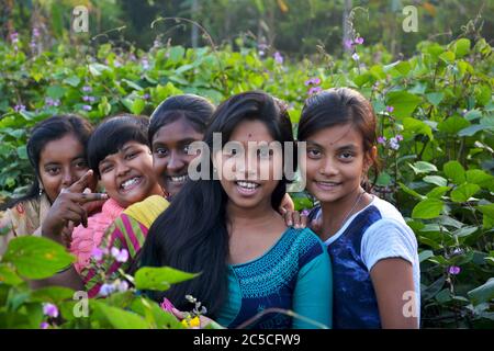 Panchita, Bongaon, West Bengal, India, 7th Dec., 2019: A group beautiful Indian teenage girls in a group in the fields, selective focusing Stock Photo
