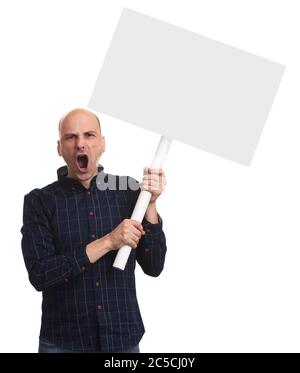 Angry bald man is holding a blank placard on a stick. Shouting man isolated on white Stock Photo