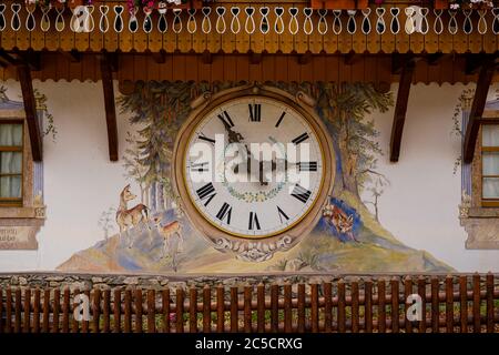 Breitnau, Baden-Württemberg, Germany - July 27 2019 : close-up of the big clock on the cuckoo clock house in Hofgut Sternen, High Black Forest near Fr Stock Photo