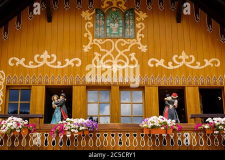Breitnau, Baden-Württemberg, Germany - July 27 2019 : close-up of the dancing figures on the cuckoo clock house in Hofgut Sternen, High Black Forest n Stock Photo
