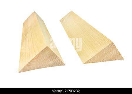 Two wooden wedges isolated on a white background with a clipping path. Stock Photo