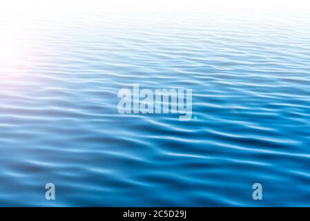 Water surface sea or ocean with sunlight as background Stock Photo