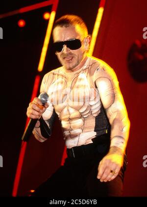 U2 on the opening night of their Pop Mart Tour 25th April 1997 at the Sam Boyd Stadium, Las Vegas,USA:  Bono Stock Photo