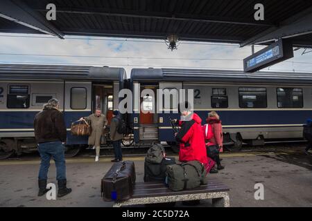 BUCHAREST, ROMANIA - FEBRUARY 15, 2020: Passengers unboarding an intercity train from CFR Calatori, the romanian railways company, in Gara de Nord, th Stock Photo