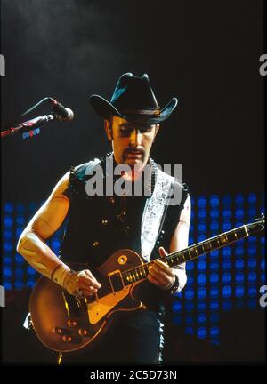 U2 on the opening night of their Pop Mart Tour 25th April 1997 at the Sam Boyd Stadium, Las Vegas,USA:  The Edge Stock Photo