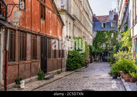 Paris, France - June 24, 2020: Passage Lhomme with its vegetation and its old workshops in Paris 11th district Stock Photo