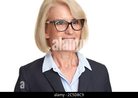Mature woman in suit wearing glasses looking away. Isolated on white Stock Photo