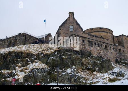 Snowy view of Edinburgh Castle walls in winter Stock Photo