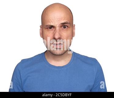 shocked 40s bald man isolated on white studio background Stock Photo