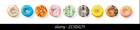 Various colourful donuts in a row isolated on white background Stock Photo