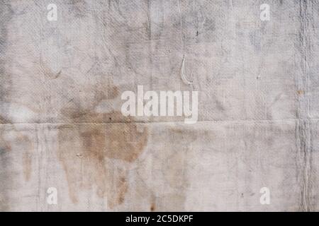 Dirty cleaning rag background texture in white background. Kanebo or Chamois texture Stock Photo