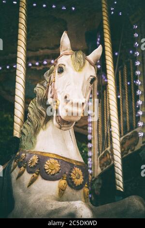 Carousel white horse with vintage look Stock Photo