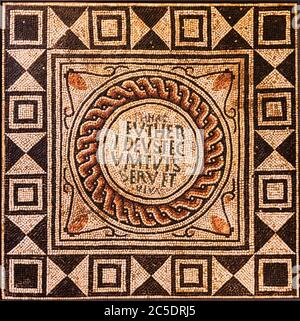 Fragment of an ancient floor mosaic. Colorful small tiles, ornament and regular forms. Roman, Italy Stock Photo