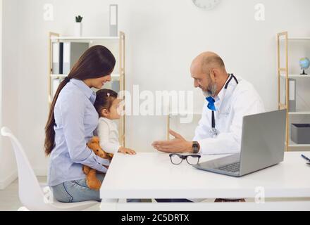 Family visiting pediatrician doctor at medical hospital. Stock Photo