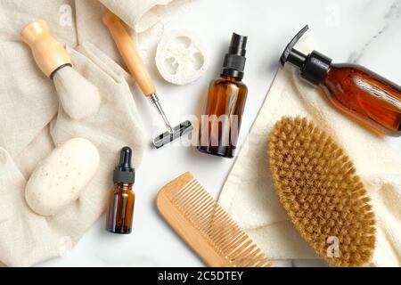 Set of bath accessories and shaving tools for men skin care. Flat lay, top view. SPA natural organic cosmetic products, eco-friendly bathroom items. Stock Photo