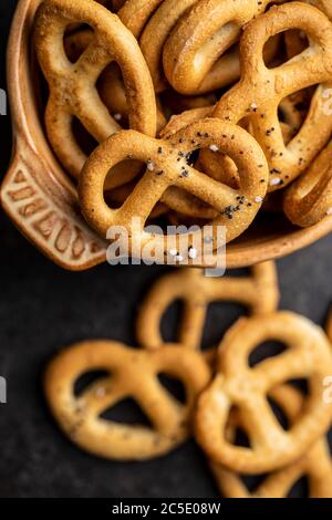 Crispy salted pretzels in bowl. Stock Photo