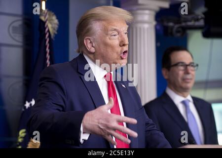Washington, United States. 02nd July, 2020. President Donald J. Trump participates in a news conference on jobs figures, in the James Brady Press Briefing Room of the White House in Washington, DC, USA, 02 July 2020. The US added 4.8 million jobs in June as the economy tried to recover during the coronavirus COVID-19 pandemic. Photo Michael Reynolds/UPI Credit: UPI/Alamy Live News Stock Photo