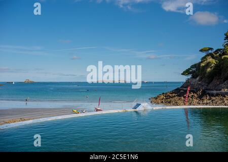 Seawater pool on the beach, Plage de L'Ecluse, Dinard, Brittany, France Stock Photo