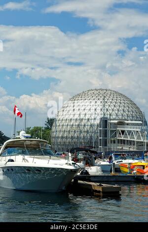 Marina and geodesic dome containing Imax theatre in Ontario Place amusement park in Toronto Ontario Canada. Stock Photo