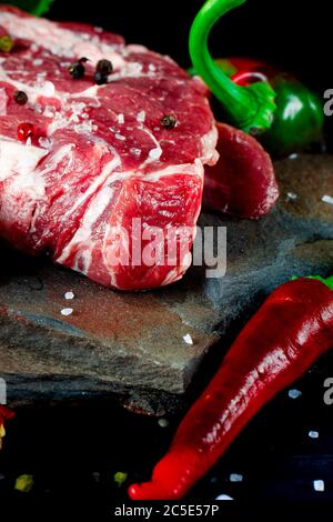 Food set for a picnic. Beef steaks ribeye ready to cook at barbecue Stock Photo