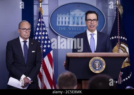 Washington, United States. 02nd July, 2020. Director of the US National Economic Council Larry Kudlow (L) and US Treasury Secretary Steven Mnuchin (R) participate in a news conference on jobs figures in the James Brady Press Briefing Room of the White House in Washington, DC, on Thursday, July 2, 2020. The US added 4.8 million jobs in June as the economy tried to recover during the coronavirus COVID-19 pandemic. Photo Michael Reynolds/UPI Credit: UPI/Alamy Live News Stock Photo