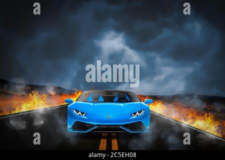 Composite image of a Lamborghini Spyder on a road in the Nevada desert.  Storm clouds behind and the road verges on fire. Stock Photo